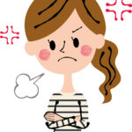 怒っている